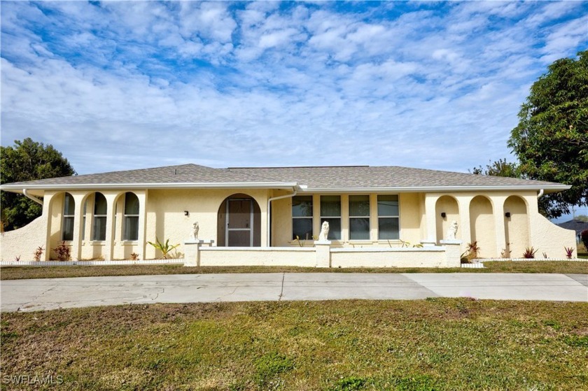 This wonderful Cape Coral pool retreat has numerous charming - Beach Home for sale in Cape Coral, Florida on Beachhouse.com