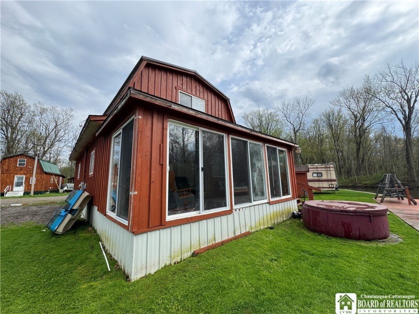 Located on a fresh flowing creek leading right out onto - Beach Home for sale in North Harmony, New York on Beachhouse.com