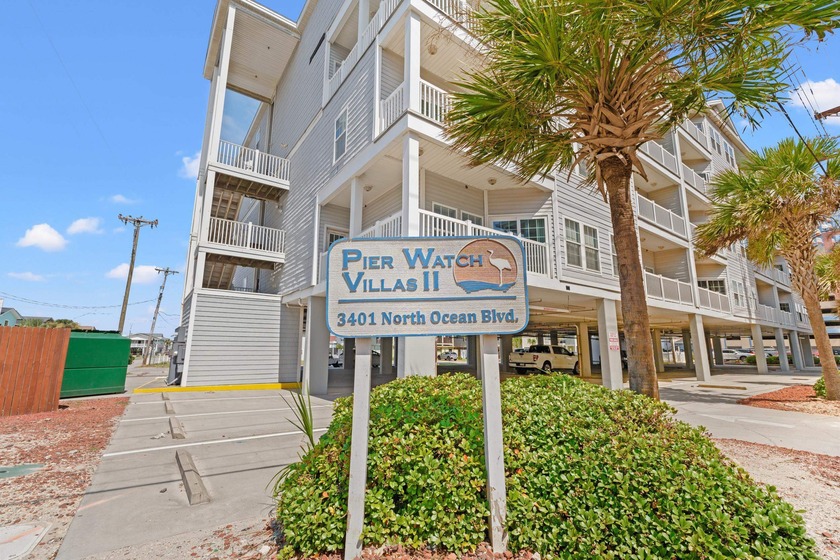 Perched just steps from the sand, this bright and breezy beach - Beach Condo for sale in North Myrtle Beach, South Carolina on Beachhouse.com