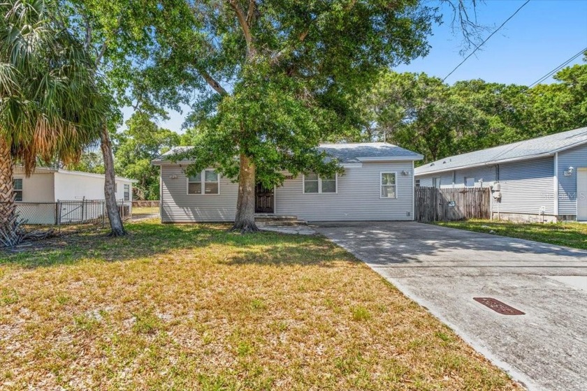 Step back in time and embrace the charm of this updated 1930s - Beach Home for sale in Largo, Florida on Beachhouse.com