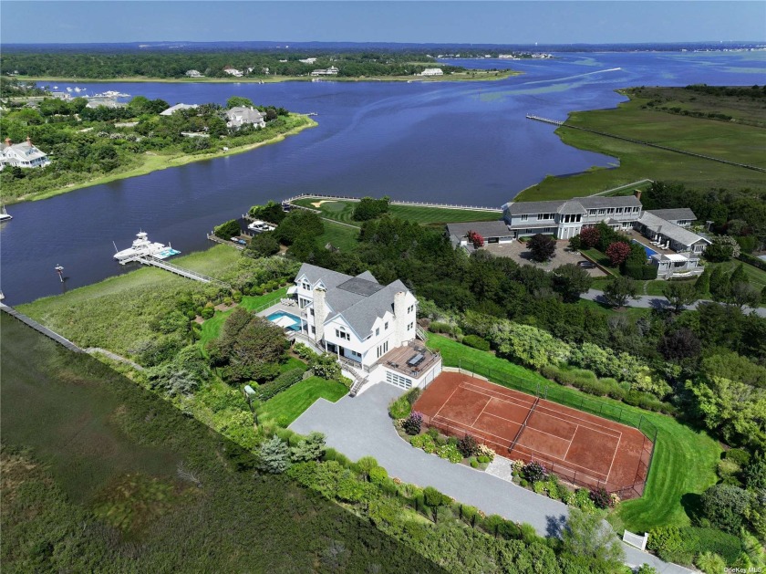Step into a realm of pure Resort Style living and waterfront - Beach Home for sale in Quogue, New York on Beachhouse.com