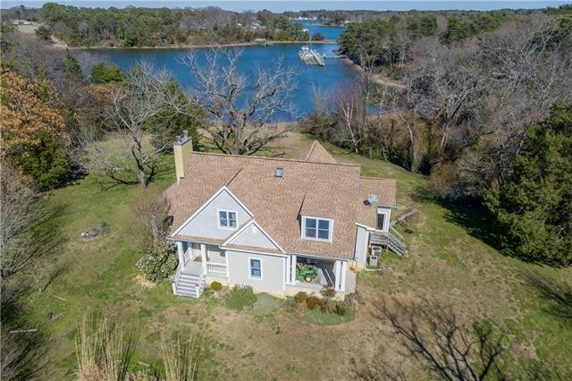 This spacious waterfront home is situated on 3.5+ private acres - Beach Home for sale in Deltaville, Virginia on Beachhouse.com
