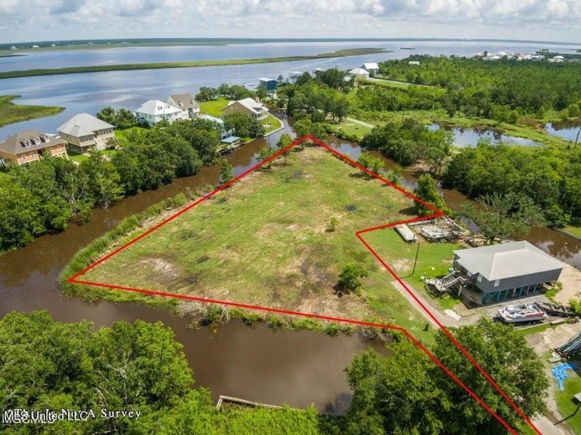 Discover the ultimate waterfront property that offers an - Beach Lot for sale in Bay Saint Louis, Mississippi on Beachhouse.com