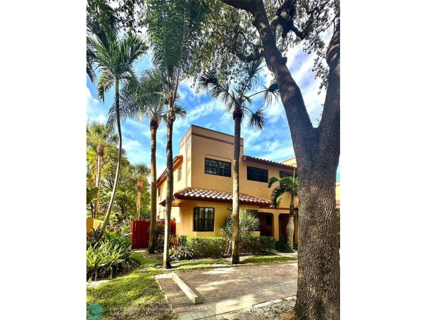 Tucked away in a charming, tree-lined community, this rarely - Beach Townhome/Townhouse for sale in Fort Lauderdale, Florida on Beachhouse.com