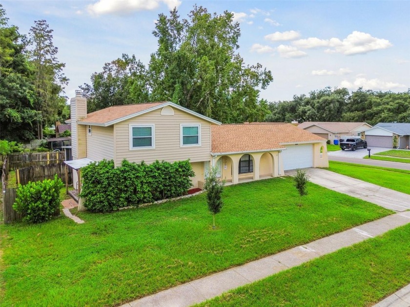 Welcome to this spacious two-story Florida home nested in the - Beach Home for sale in Tampa, Florida on Beachhouse.com