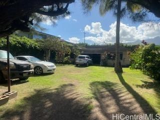 Located in Waialua on a quiet loop, this unique property is - Beach Home for sale in Waialua, Hawaii on Beachhouse.com