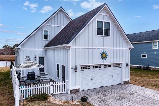 Step into the open-concept design that invites natural light and - Beach Home for sale in Warsaw, Virginia on Beachhouse.com