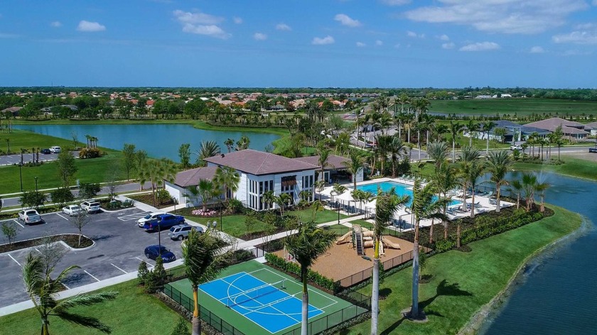 The open Family Room/Kitchen layout, Outdoor Living Area, and - Beach Home for sale in Sarasota, Florida on Beachhouse.com