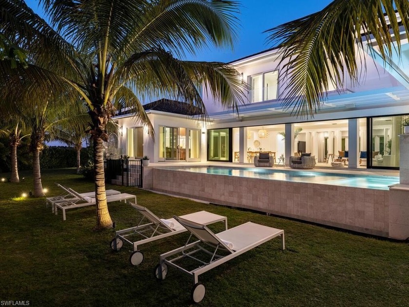Discover the essence of coastal luxury in this exceptional - Beach Home for sale in Naples, Florida on Beachhouse.com