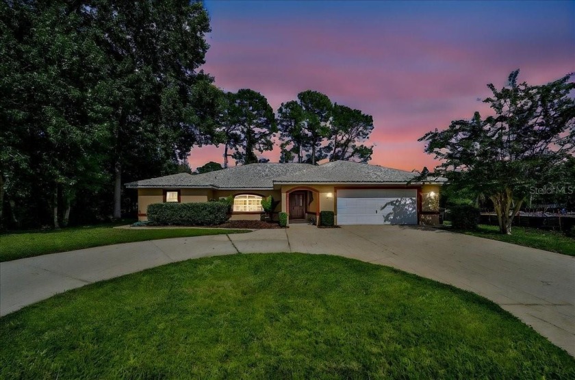 Discover the charm of 57 Woodhollow Dr, a stunning custom-built - Beach Home for sale in Palm Coast, Florida on Beachhouse.com