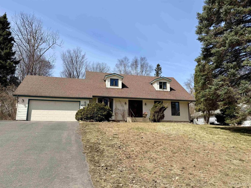 Welcome to this well-maintained 4-bedroom, 3 bath home in the - Beach Home for sale in Marquette, Michigan on Beachhouse.com
