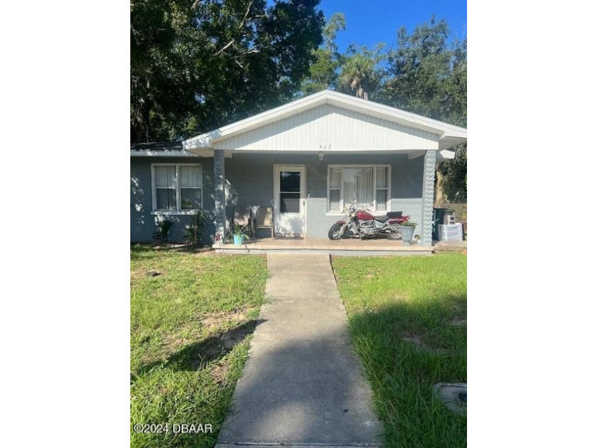 This cozy 3-bedroom, one bathroom home features an open floor - Beach Home for sale in Daytona Beach, Florida on Beachhouse.com