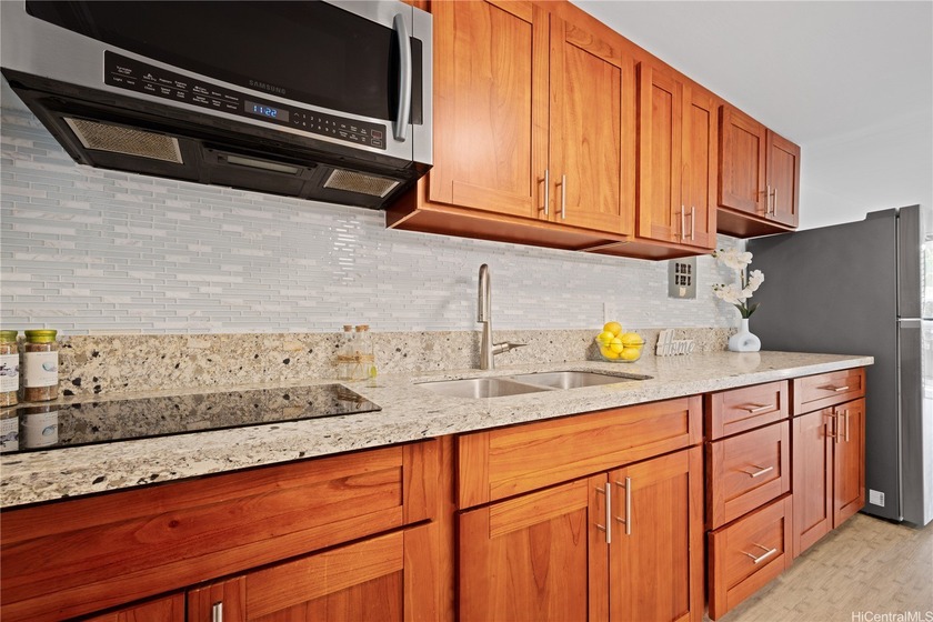 Tucked away on the cool and private side of the building, this - Beach Condo for sale in Honolulu, Hawaii on Beachhouse.com