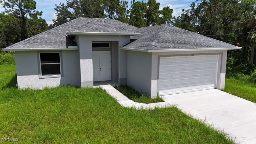 Stunning new construction - move-in ready 3-bedroom, 2-bath home - Beach Home for sale in Lehigh Acres, Florida on Beachhouse.com