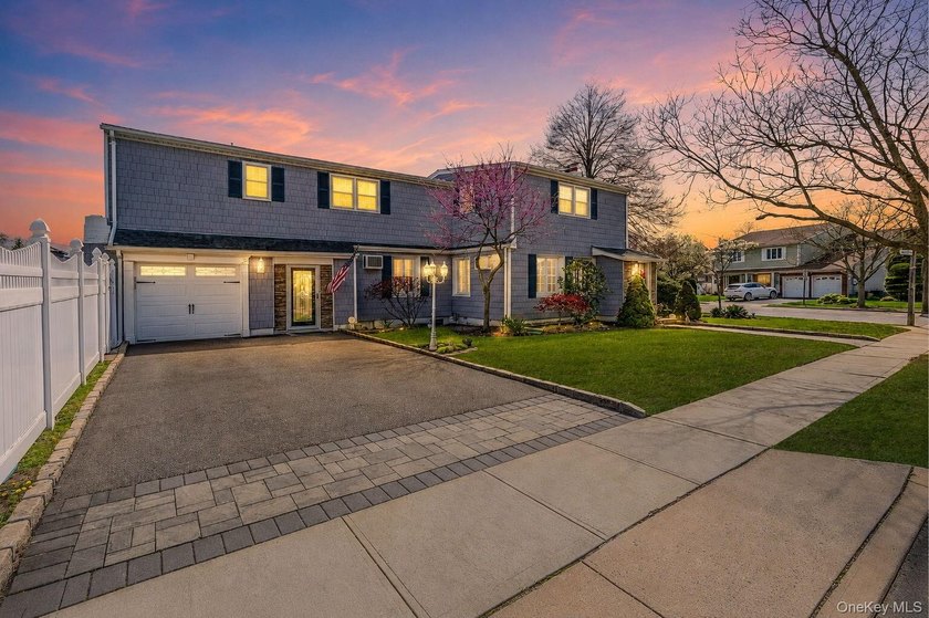 Welcome to this stunning waterfront Colonial located in the - Beach Home for sale in Massapequa, New York on Beachhouse.com