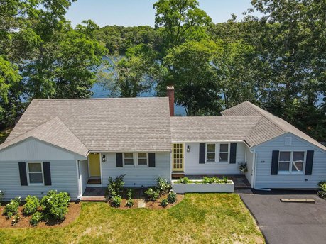 Enjoy views of Fresh Pond from every room of this bright and - Beach Home for sale in East Falmouth, Massachusetts on Beachhouse.com