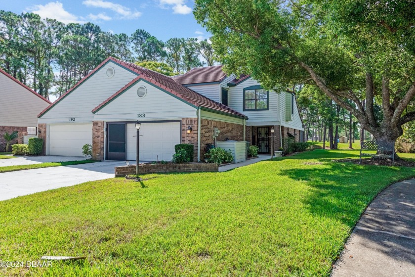 Discover a captivating 2-bedroom, 2-1/2-bath home featuring an - Beach Townhome/Townhouse for sale in Daytona Beach, Florida on Beachhouse.com