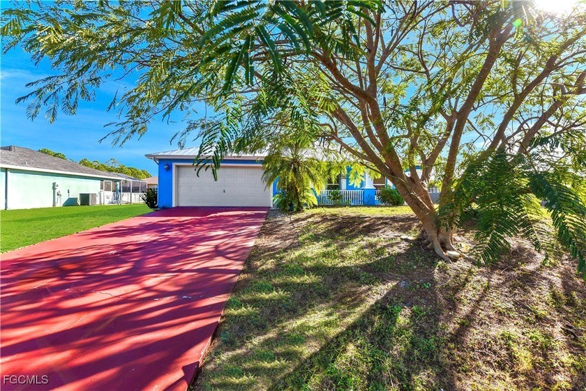 Welcome to this 3/2 + DEN nestled on a quiet street just minutes - Beach Home for sale in Lehigh Acres, Florida on Beachhouse.com