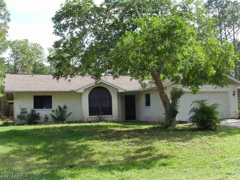 Four bedroom and two full baths with in-ground POOL. Half acre - Beach Home for sale in Lehigh Acres, Florida on Beachhouse.com