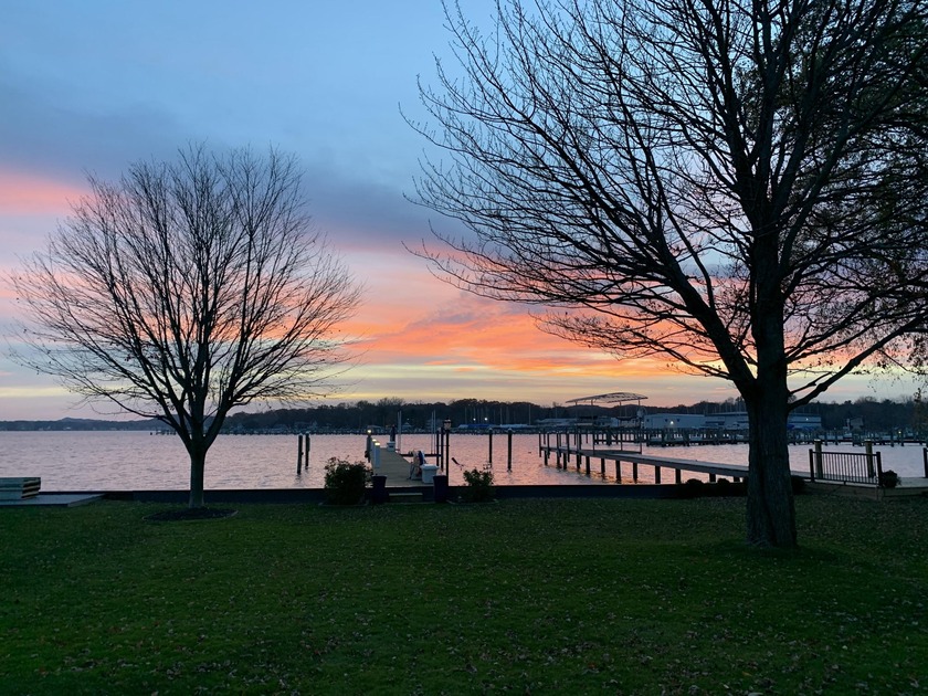 Welcome to this fully updated cottage-style retreat on Lake - Beach Home for sale in Holland, Michigan on Beachhouse.com