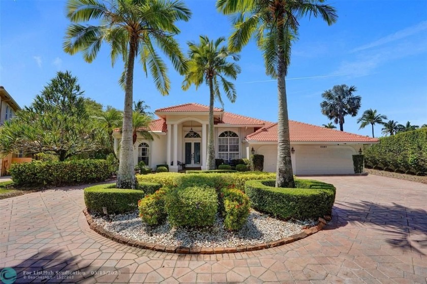 Dream Home Paradise! Stunning lakefront estate on a guard-gated - Beach Home for sale in Coral Springs, Florida on Beachhouse.com