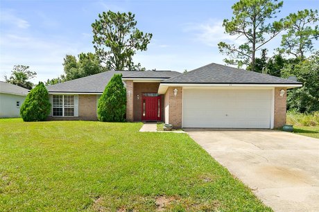 This well maintained 4 bedroom  2 bathroom Adams built brick - Beach Home for sale in Palm Coast, Florida on Beachhouse.com