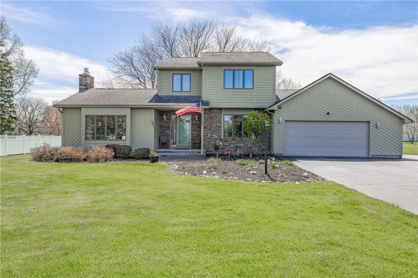 STUNNING CONTEMPORARY COLONIAL WHERE TIMELESS ELEGANCE MEETS - Beach Home for sale in Webster, New York on Beachhouse.com