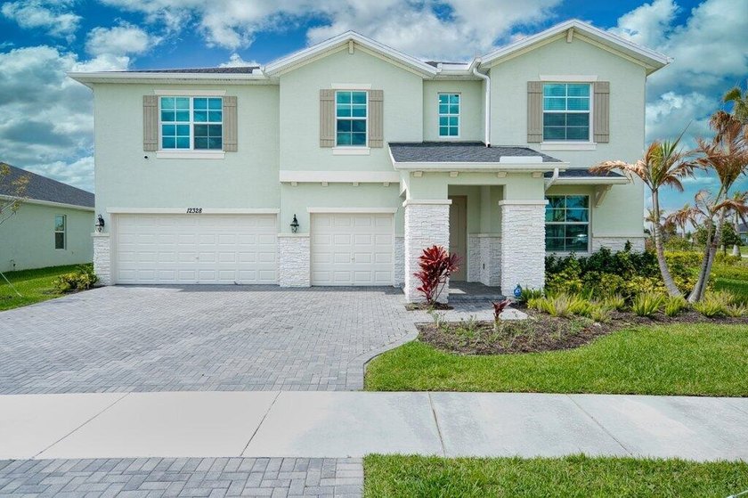 Experience elevated living in this 2024-built residence in the - Beach Home for sale in Port Saint Lucie, Florida on Beachhouse.com