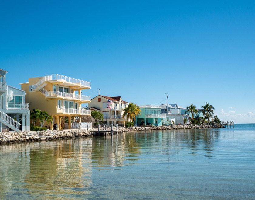 Luxurious 3 story residence with 73' of open water on a private - Beach Home for sale in Conch Key, Florida on Beachhouse.com