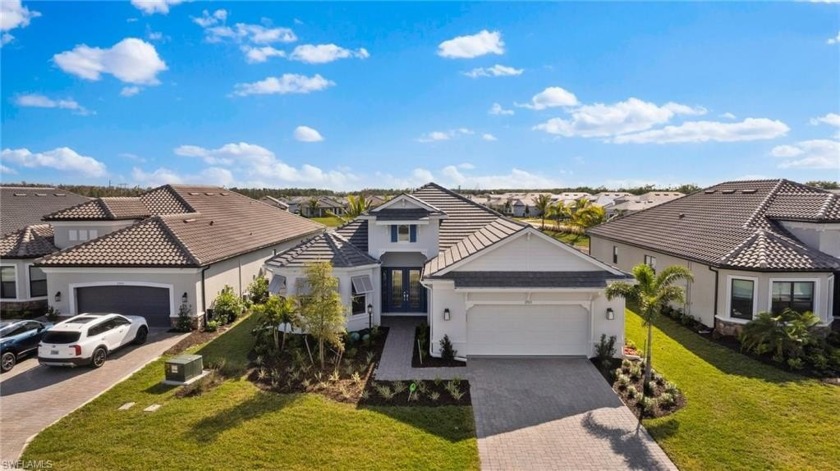 Brand New Waterfront Construction in Esplanade Lake Club - - Beach Home for sale in Fort Myers, Florida on Beachhouse.com