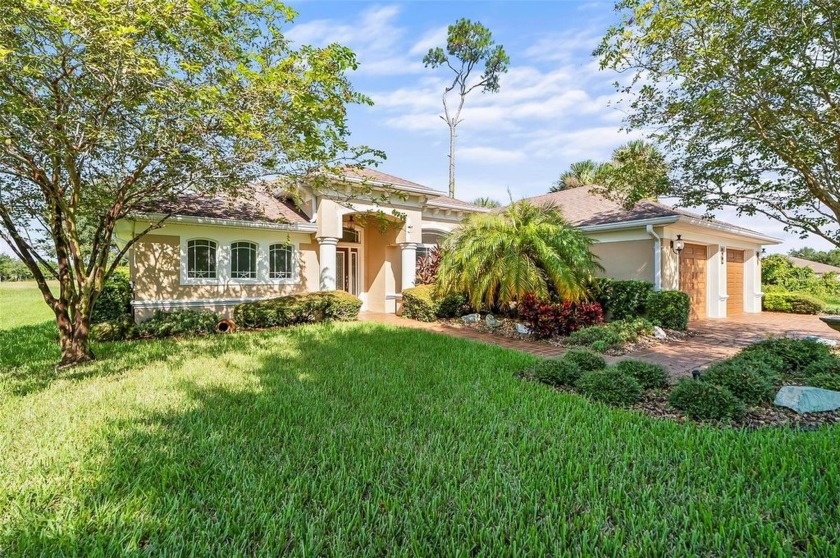 This home is located in the beautiful GATED community of Palm - Beach Home for sale in Palm Coast, Florida on Beachhouse.com