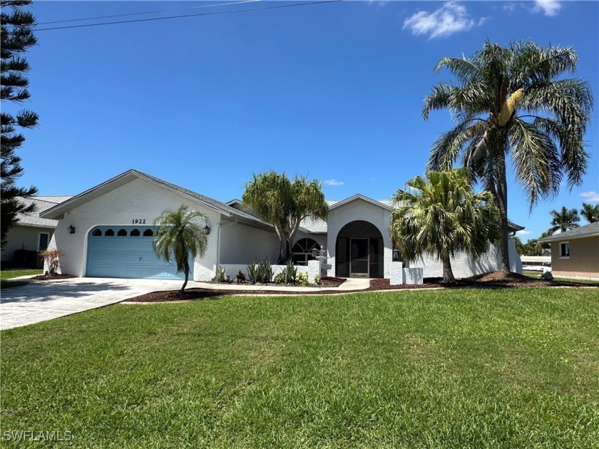 Investors/Handyman's Dream! Spacious 3 bedroom + den 3 bath gulf - Beach Home for sale in Cape Coral, Florida on Beachhouse.com