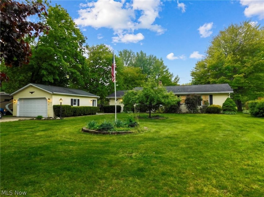 Welcome to this 4-bedroom, 2-bathroom ranch offering convenient - Beach Home for sale in Madison, Ohio on Beachhouse.com