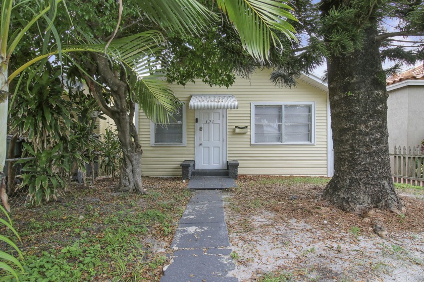 Discover historic charm and modern convenience in this updated 1 - Beach Home for sale in Lake Worth Beach, Florida on Beachhouse.com