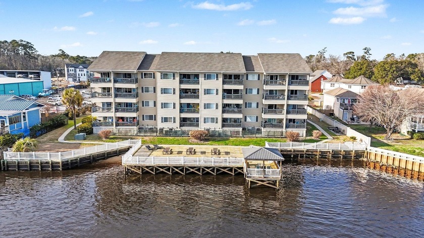 This first-floor end unit features one bedroom and two full - Beach Condo for sale in Little River, South Carolina on Beachhouse.com