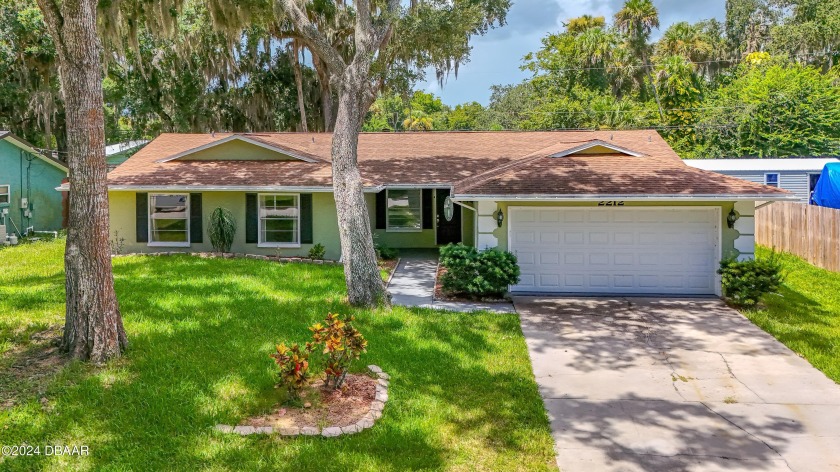 FANTASTIC FAMILY HOME WITH FRESH INTERIOR PAINT AND NEW FLOORING - Beach Home for sale in Edgewater, Florida on Beachhouse.com