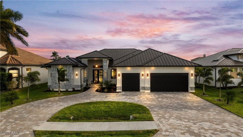 Step into a world of contemporary elegance with this - Beach Home for sale in Cape Coral, Florida on Beachhouse.com