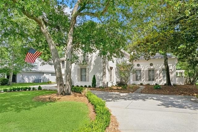 Luxury living awaits in the gated community of Beau Chene. This - Beach Home for sale in Mandeville, Louisiana on Beachhouse.com