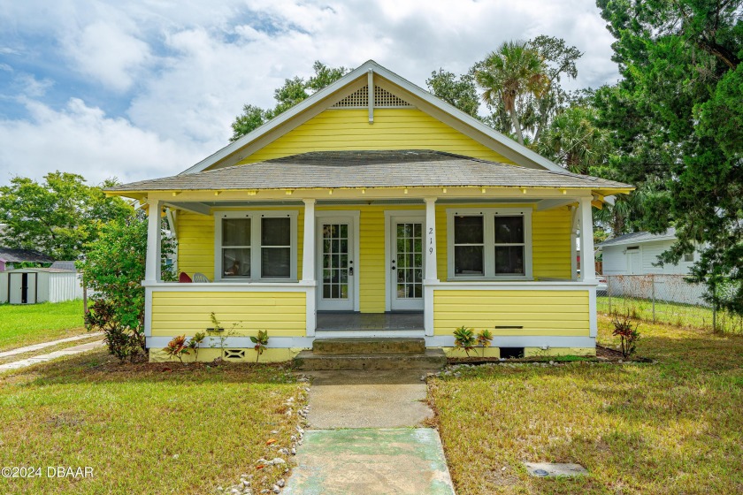 Welcome to this charming 1939 bungalow, a delightful blend of - Beach Home for sale in Daytona Beach, Florida on Beachhouse.com