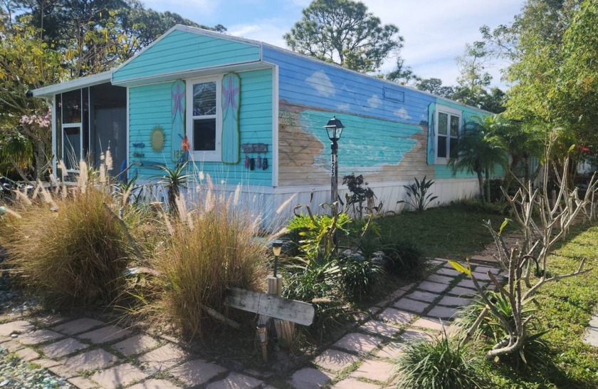 Welcome to this spacious 2/2 beachy bungalow with a large - Beach Home for sale in Melbourne, Florida on Beachhouse.com