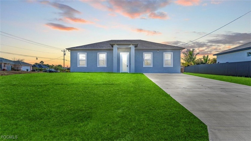 Discover this beautifully designed modern home, ideally and - Beach Home for sale in Lehigh Acres, Florida on Beachhouse.com