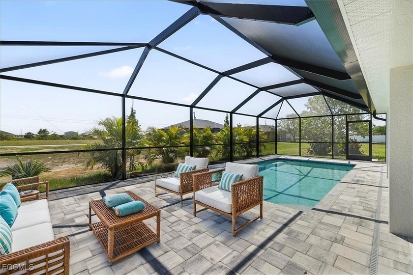 SPACIOUS POOL HOME WITH DUAL PRIMARY SUITES! Welcome to the - Beach Home for sale in Cape Coral, Florida on Beachhouse.com