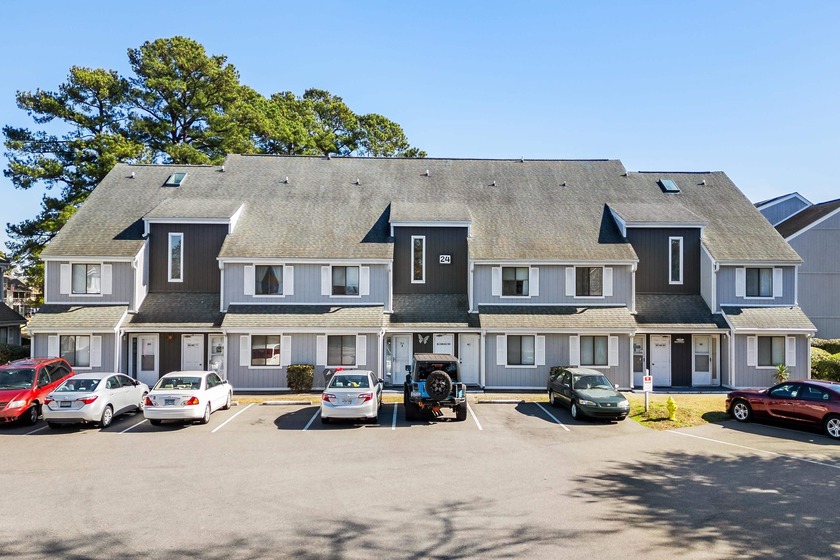 Overlooking the pool this bright & spacious 2-bedroom, 2-bath - Beach Condo for sale in Little River, South Carolina on Beachhouse.com