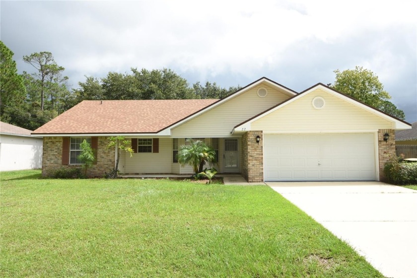 Beautiful brick home in Indian Trails. 3 bedrooms, 2 bathrooms - Beach Home for sale in Palm Coast, Florida on Beachhouse.com