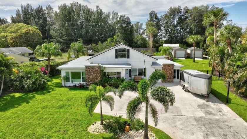 Nicely updated home boasting 3 spacious bedrooms with a gorgeous - Beach Home for sale in Fort Pierce, Florida on Beachhouse.com