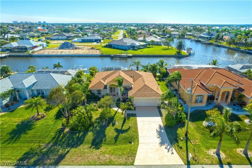 Highly sought-after SW Cape area GULF ACCESS POOL HOME! BOASTS - Beach Home for sale in Cape Coral, Florida on Beachhouse.com