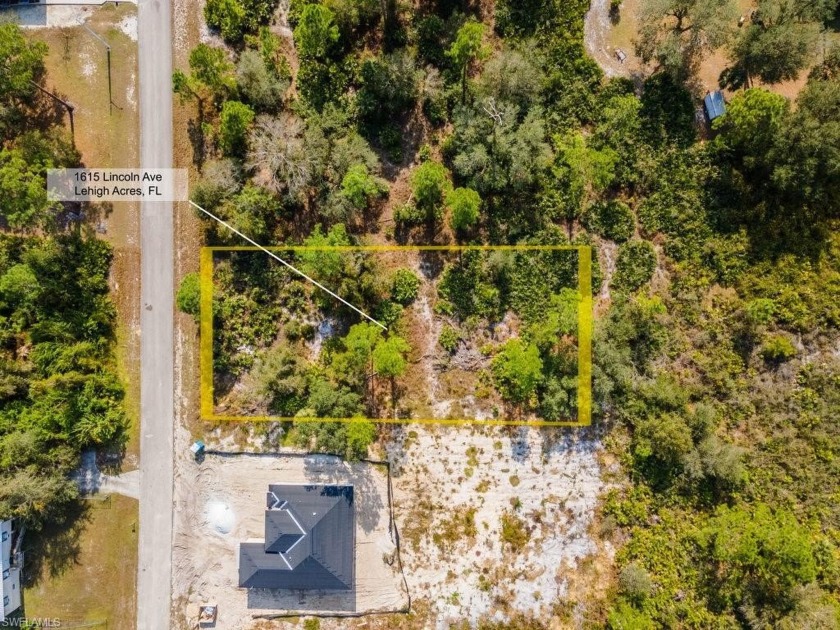 Nestled on a spacious .50-acre lot, this prime piece of real - Beach Lot for sale in Lehigh Acres, Florida on Beachhouse.com