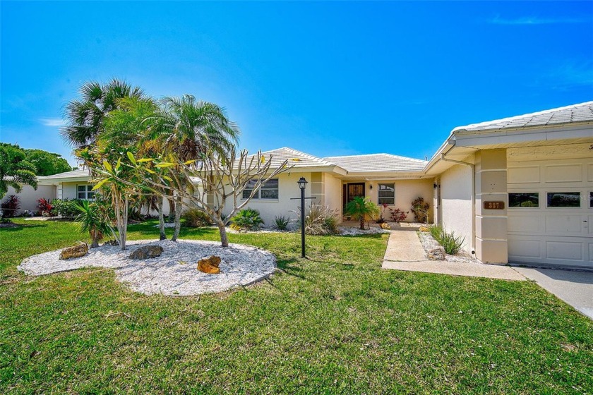 Step into your charming villa nestled in the tranquil heart of - Beach Home for sale in Nokomis, Florida on Beachhouse.com