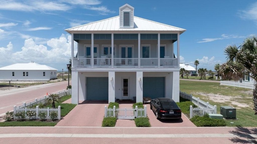 Nestled in the Shores, this exquisite four-bedroom - Beach Home for sale in South Padre Island, Texas on Beachhouse.com