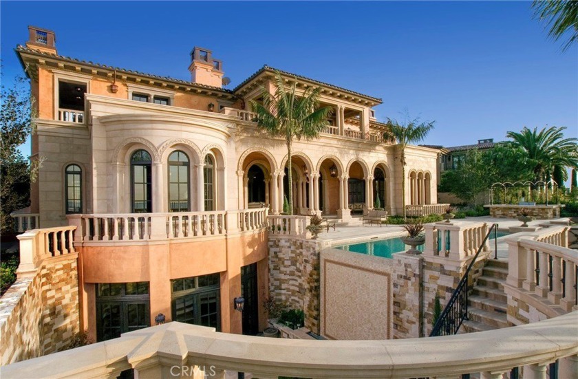 Perched at the highest elevation in the prestigious, guard-gated - Beach Home for sale in Newport Coast, California on Beachhouse.com